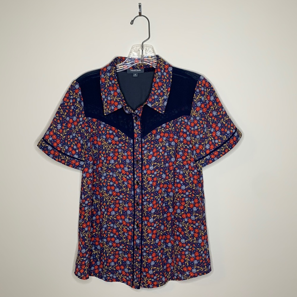 Sheer floral and navy western blouse.